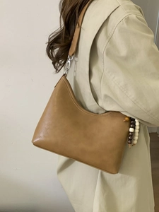 Brown leather hobo shoulder bag with wooden beads decoration for autumn fashion