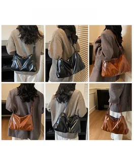 Multiple views of vintage tote bag in black and brown soft leather with shoulder strap