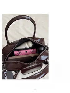 Top view of dark brown oil wax leather bag interior showing high storage capacity