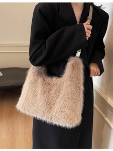 Fashionable light brown plush faux fur crossbody dumpling bag with brown leather strap