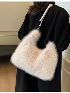 Chic beige faux fur hobo bag with leather strap, plush winter crossbody for women