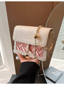 Fashionable beige and pink woven crossbody bag with gold chain strap for women
