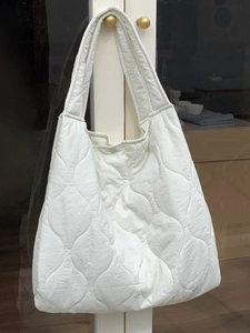 White quilted tote bag made of soft nylon with large capacity for casual shoulder carry