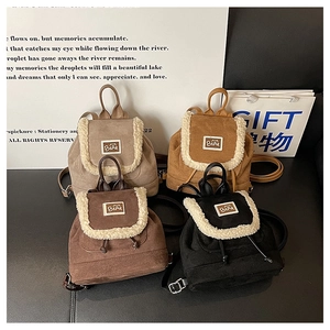 Mini fuzzy bucket backpacks in four colors with faux fur trim and bear logo patches