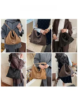 Vues multiples du sac fourre-tout rétro en cuir souple porté à l'épaule et en bandoulière