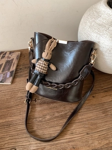 Vintage PU Leather Bucket Bag For Women Fashion Woven Handle Crossbody Shoulder Bag Rabbit Pendant Lettering Decor