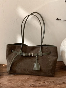 Retro dark green matte suede tote bag with strap buckle detail and long handles