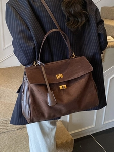 Retro coffee brown suede tote bag with metal twist locks and adjustable shoulder strap