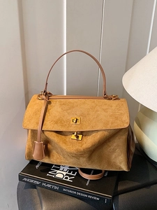 Vintage brown suede tote bag with single handle and gold metal twist-lock for women