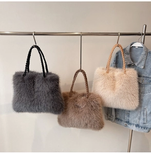 Three plush tote bags in grey, brown and cream with woven handles for winter