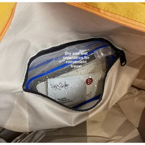 Detail view of large travel bag interior with waterproof dry-wet separation pocket