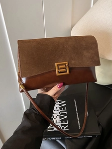 Retro brown crossbody shoulder bag with suede leather stitching and gold geometric buckle