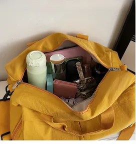 Detail view of large capacity yoga fitness travel bag showing spacious interior and storage