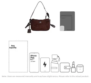 Internal capacity detail of retro underarm bag showing smartphone, umbrella and wallet