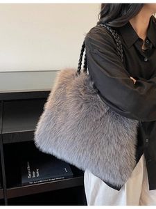 Trendy large grey plush tote bag with black woven handles for autumn and winter