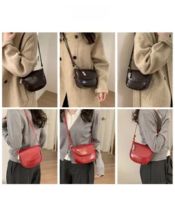 Detail shots of smooth saddle crossbody bags in brown and red showing styling on coats
