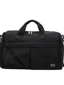 Large black travel duffel bag with multiple pockets for fitness, yoga, and gym sessions