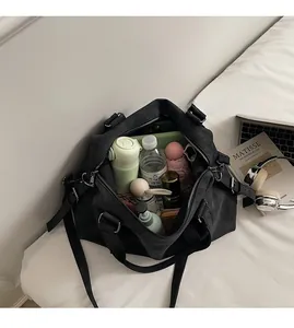 Spacious interior of black vintage tote bag showing large capacity for daily essentials