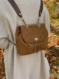 Brown quilted suede backpack with chain straps and retro metal lock for women