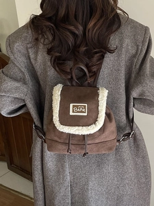 Vintage brown suede mini backpack with plush shearling trim and bear embroidery