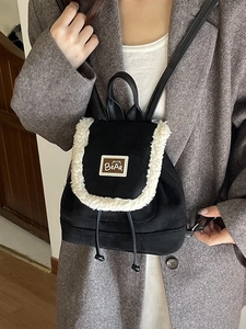 Vintage mini black backpack for women with white faux fur trim and leather straps