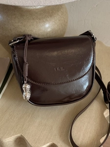 Women Minimalist PU Leather Saddle Bag Retro Glossy Crossbody Bag With Metal Peanut Charm Small Shoulder Bag Underarm Bag