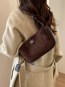 Vintage dark brown suede underarm shoulder bag with elegant silver metallic twist lock