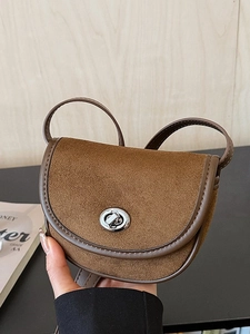 Brown frosted suede saddle bag with silver rotary lock for retro commuter women