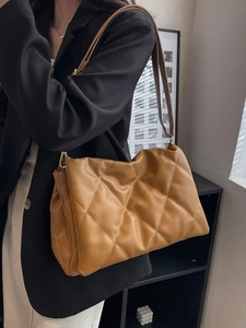 Quilted caramel leather tote bag with white contrast stitching for women fashion