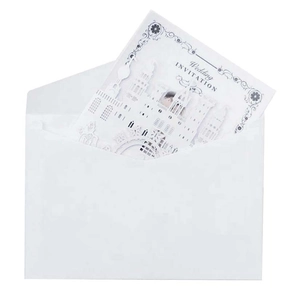 Detail of 3D laser cut castle wedding invitation with matching envelope and elegant text