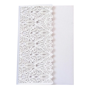 Detailed laser-cut floral pattern on elegant white pearlescent paper invitation card