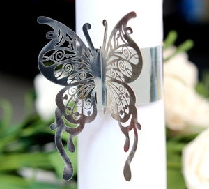 Elegant silver butterfly napkin ring with laser-cut hollow pattern for party table decor