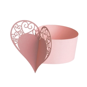 Detailed laser-cut pink heart napkin ring with intricate vine patterns and pearlescent finish