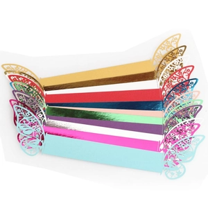 Laser cut butterfly paper napkin rings set in ten vibrant colors for wedding table decor