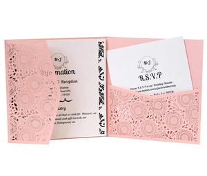 Elegant laser-cut lavender wedding invitation set with floral patterns and RSVP card