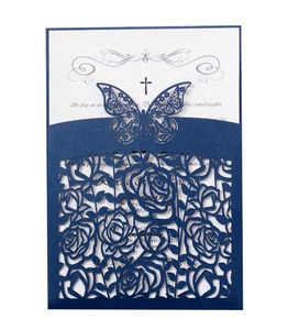 Navy blue laser-cut floral wedding invitation with intricate butterfly and rose patterns
