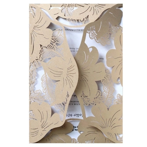Champagne gold laser-cut floral wedding invitation with a white inner card insert