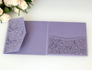 Detailed laser-cut lavender square invitation card with elegant floral hollow patterns