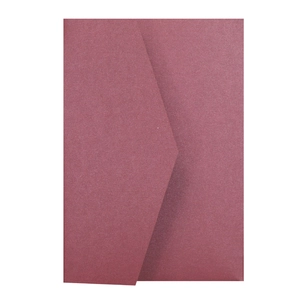 Macro shot of dark red pearl paper envelope with V-flap and premium metallic texture
