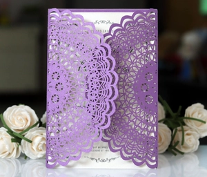 Deep purple laser-cut lace wedding invitation with pearlized finish and white inner card
