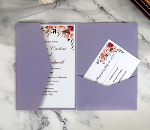 Detail of lavender wedding invitation set with watercolor flowers and RSVP card