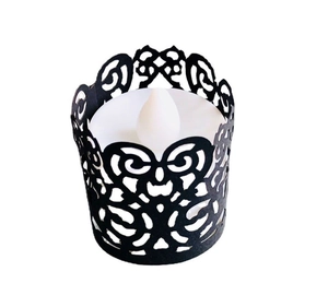Detailed laser-cut black hollow pattern sleeve with white LED tea light candle