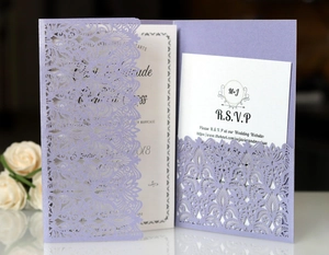 Detailed laser-cut purple lace invitation card with elegant RSVP and white rose decor