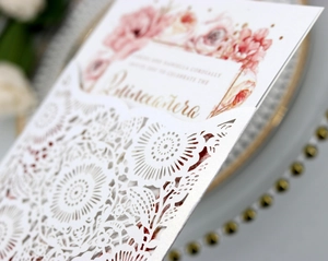 Detailed laser-cut pearl white invitation with pink rose inner card for Quinceañera party