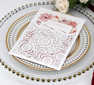 Laser cut white floral wedding invitation sleeve with pink rose quinceañera insert card