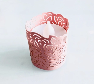 Detailed laser cut rose gold floral lantern with internal white flickering LED tea light