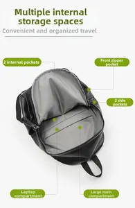 Vue intérieure du sac à dos noir montrant le compartiment PC et les poches de rangement