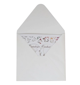 Elegant laser cut wedding invitation with white envelope and romantic couple silhouette