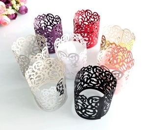 Detailed laser-cut hollow tea light candle wraps in various metallic and matte colors