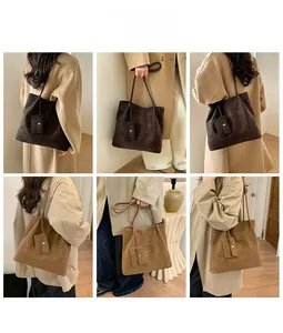 Detailed views of vintage large capacity tote bag and matching detachable charm pouch